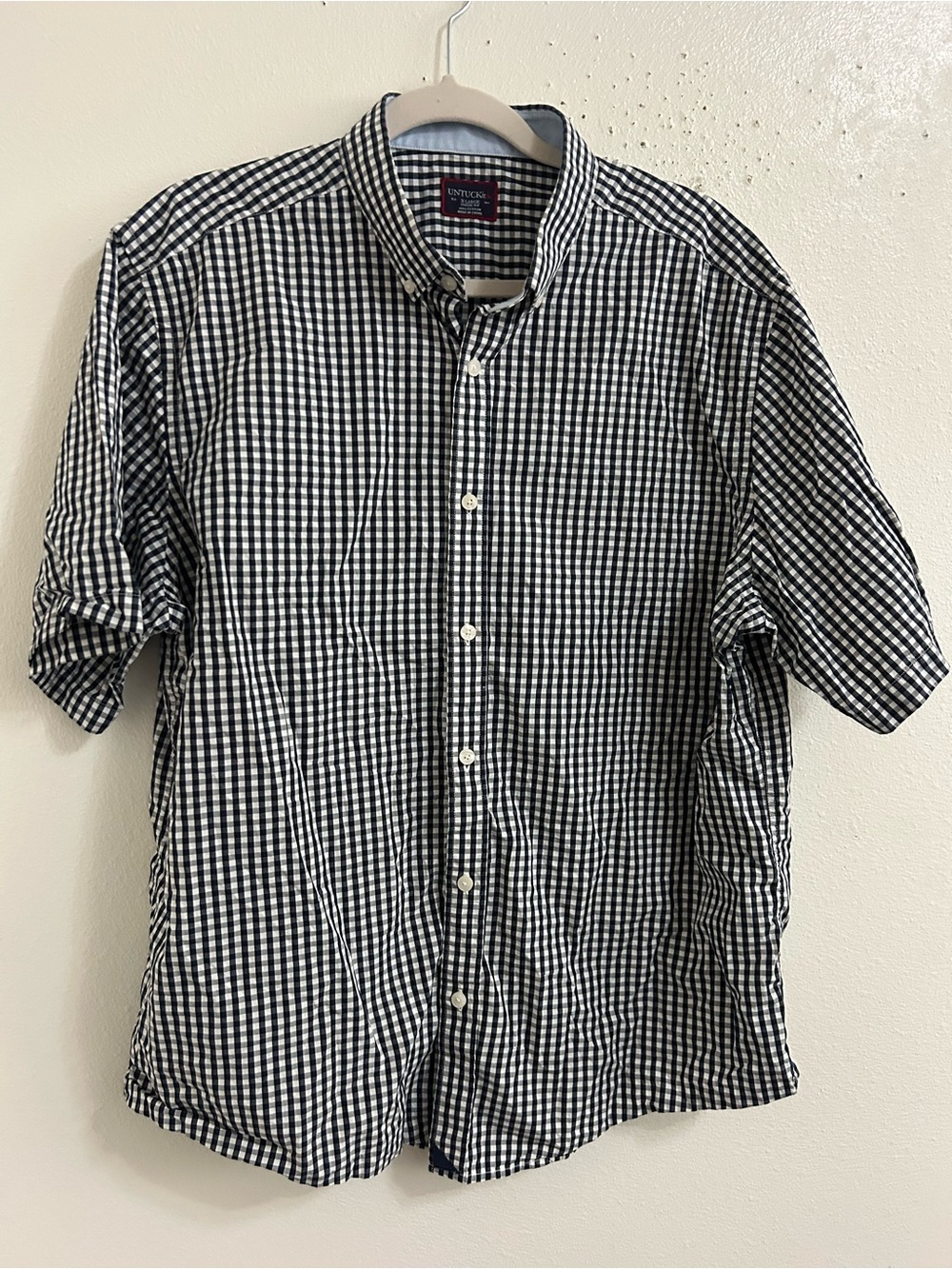 Untuckit black and white checked short sleeve button down shirt